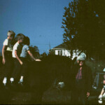 Another shot of we boys on old Charlie, with Great Grandpa Hockersmith, and Dad holding Pat. Fall 1961