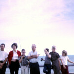 Our family at the southern-most point of Key West. Dec 29, 1966. We had our Christmas presents with us (walkie-talkies). Pat seems unimpressed.