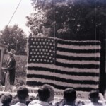 Apparently a parade, from and old black&white negative.