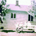 July 1961 - the 4 of us on the picnic table behind our house. So overexposed that I didn't take the time to clean it up.