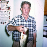 GrandpaWithFishMay28_1963 Grandpa with a nice bass from the pond.