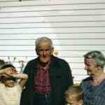 Summer 1961 - Joe, David, and Mark with Great Grandpa Hockersmith and Great Grandma Hockersmith., at their Indiana house. We didn't visit them very often, sad to say. They were my Grandma Offutt's (Daisy's) parents.