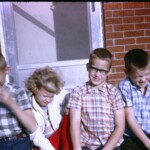 KidsNov1963 Apparently I wasn't quite prepared for this one, nor was Pat. In fact, it seems to have been a shot where we all had to look straight into the sun. Better lighting, but eyes mostly closed. :)