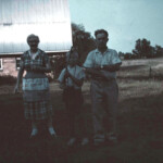 8-year old Joey with Grandma and Grandpa Crum and his trusty Daisy BB Rifle. July, 1961
