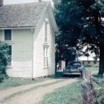 Another shot of the old farmhouse, apparent from the same day in July, 1961. The front of the 1949 DeSoto DeLuxe is clearly visible, between the pecan tree and the pear tree.