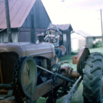 PatAtGrandmasMay1963_2 sitting on the old Allis-Chalmers WD.